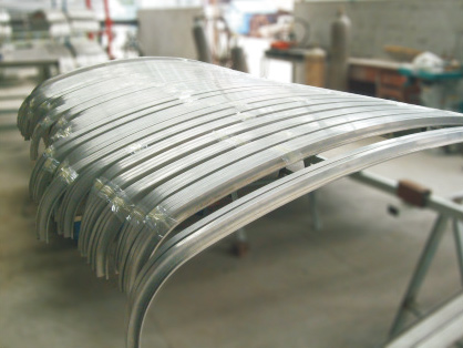 杭州拉弯加工厂为何学习盛达工业铝型材拉弯技术